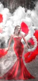 Woman in a red dress amidst vibrant red and white smoke in a forest path.