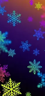 Colorful snowflakes on dark background wallpaper.