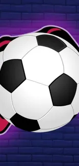 Soccer ball with a vibrant purple glow against a brick wall background.