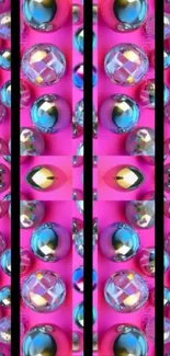 Colorful spheres on vibrant pink background.