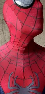 Close-up of Spider-Man suit against a textured background.