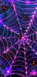 Vibrant spider web on a cosmic purple background.