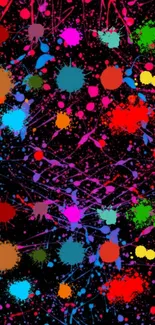 Colorful splatter art on dark wallpaper.