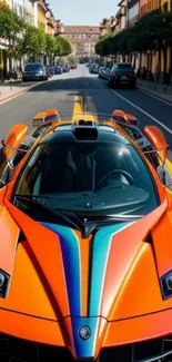 Vibrant orange sports car on city street