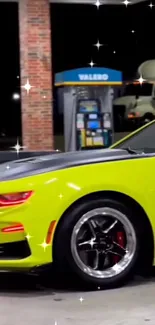 Yellow sports car parked at night with sparkles.