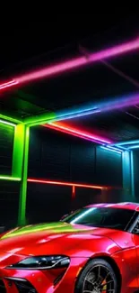 Red sports car under neon lights in a dark garage