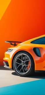 Orange sports car with vibrant background.