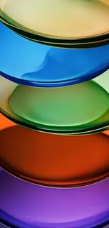 Stack of colorful discs in vibrant hues.