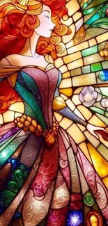 Stained glass art of a woman with flowing red hair and colorful dress.