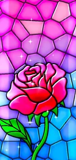 A stained glass rose with vibrant pink and blue hues in an artistic pattern.