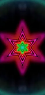 Colorful kaleidoscope star on dark background wallpaper.