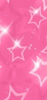 Vibrant pink wallpaper with glowing star patterns.