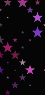 Purple and pink stars on black background wallpaper.