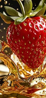A vibrant red strawberry splashing in golden liquid.