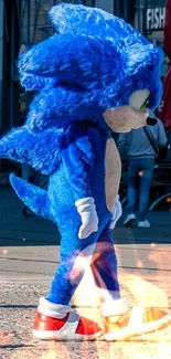 Character in blue costume walks in lively city setting.