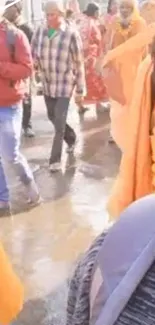 Vibrant festival crowd in traditional attire on a sunny street.