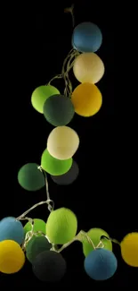 Colorful string lights on a black background, creating a vibrant mobile wallpaper.