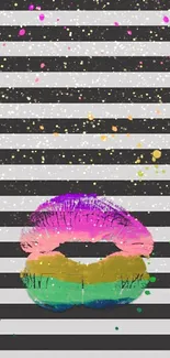 Vibrant lips on striped background with colorful splashes.