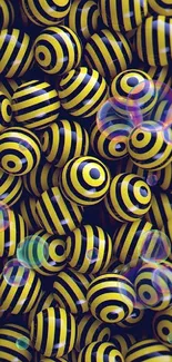 Yellow and black striped spheres in a vibrant pattern.