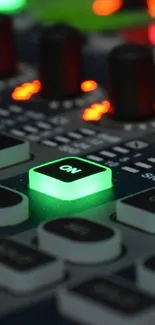 Close-up of studio equipment with glowing green ON button.