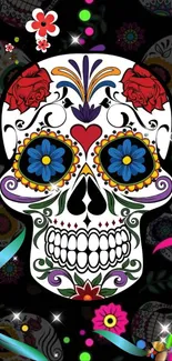 Colorful sugar skull with floral patterns on a black background.