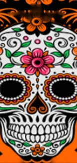 Colorful sugar skull wallpaper with floral motifs and vibrant orange accents.