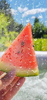 A slice of watermelon held up against a sunny, green garden view.