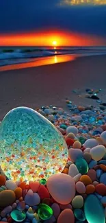 Colorful stones on a sunset beach with vivid sky.