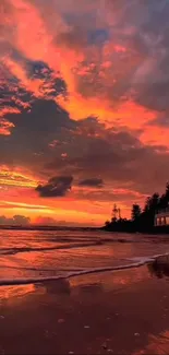 Vibrant orange and purple sunset over a tranquil beach.