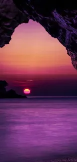 Beautiful sunset beach view with purple hues and rocky arch.