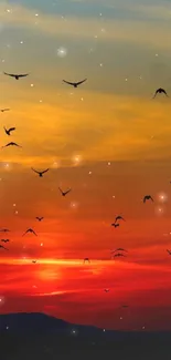 Bird silhouettes against vibrant sunset sky.