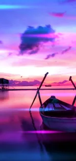 Vibrant sunset scene with boat on a calm ocean, featuring purple and pink hues.