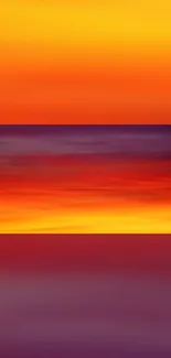 Vibrant sunset gradient wallpaper with warm orange, red, and purple hues.