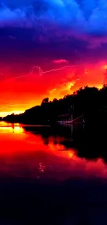 Vivid sunset with lightning over reflected water.