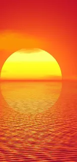 Bright sunset over ocean with vibrant orange and yellow hues.