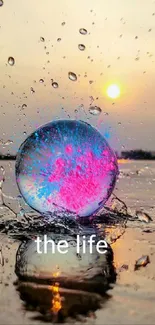 Vibrant sunset with colorful bubble reflection over water.