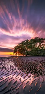 Vibrant sunset reflecting on a beach with dynamic cloud formations.