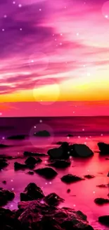 Vibrant purple and orange sunset over a rocky shore.