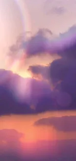 Dynamic sunset wallpaper with purple and orange hues over a cloudy sky.