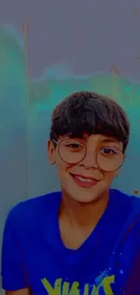 Smiling teen with glasses against a colorful background.