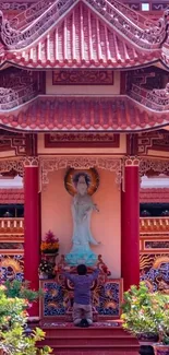 Beautiful Asian temple with vibrant details and statues.