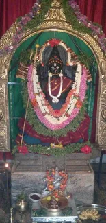 Vibrant temple deity adorned with flowers and decor in an Indian art style.