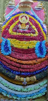 Colorful flower decoration in a temple setting for spiritual ambiance.