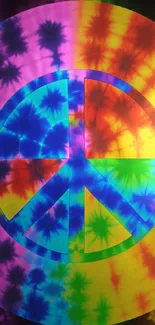 Vibrant tie-dye peace symbol wallpaper for mobile.