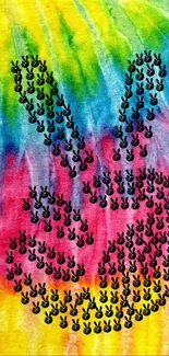 Colorful tie-dye wallpaper with peace sign design.