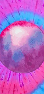 Tie-dye wallpaper with pink and blue circle design.