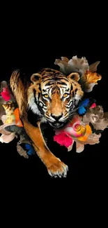 Vibrant tiger with colorful floral art on a black background wallpaper.