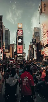 Times Square bustling with people and lights in urban scene.