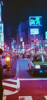 Tokyo night streetscape with bright neon lights and bustling city vibe.