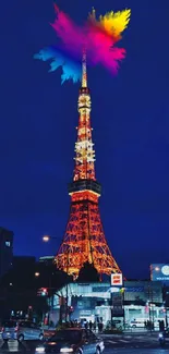 Vibrant Tokyo Tower lit up with colorful lights against a dark night sky.